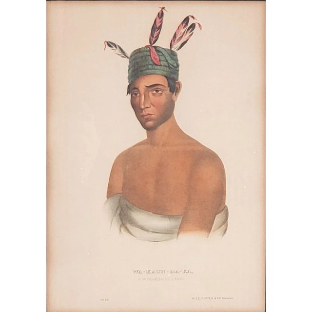 A hand-colored engraving of American Indians, 19th century.