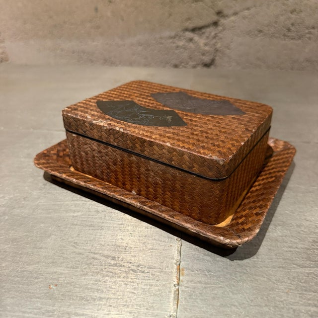 For your consideration, an antique Japanese lacquer cigarette box set featuring an intricate ajiro (bamboo strip) woven...