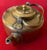 Antique 19th century English colonial brass tea kettle with swing handle. Heavy gauge construction. Measures 12 across...