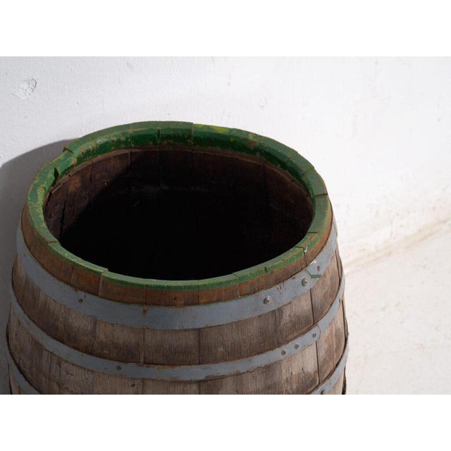 Antique wooden barrel with iron straps, traditional central european cooperage originating from central europe and dated...