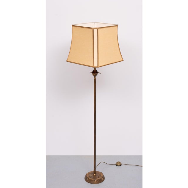 Stunning Art Deco style floor lamp . Antique Gilded Bonze color comes with a Amber color Chrystal Glass ball complete with...