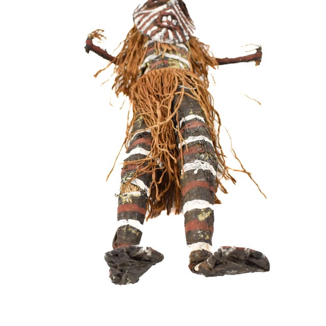 Makishi Dolls, originating in Zimbabwe and Zambia, are created on wire, painted with bold colors, and adorned with fabrics...