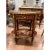 A stunning French Louis XV-style oval side table showcasing exceptional marquetry craftsmanship, elegant proportions, and...