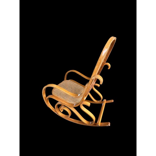 Vintage Thonet-Style Bentwood Rocking Chair – c. 1970 Description: This authentic mid-century rocking chair features...
