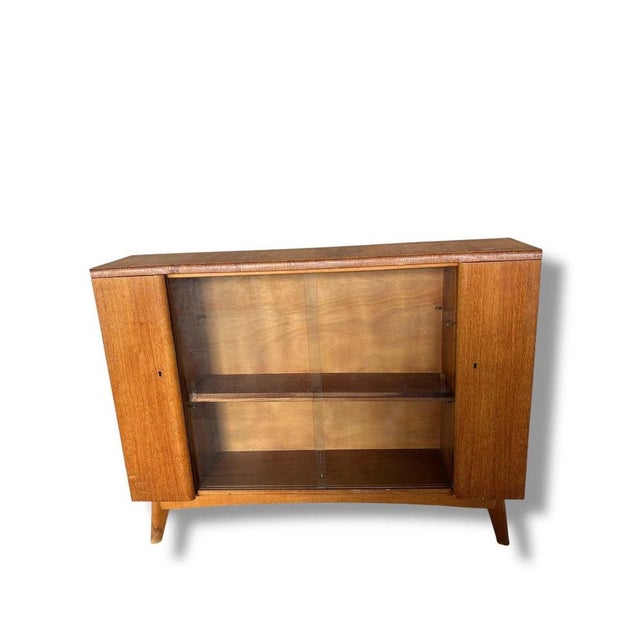 Mid-Century Drinks Cabinet in Teak with Glass Sliding Doors and Adjustable Shelf For Sale - Image 6 of 11