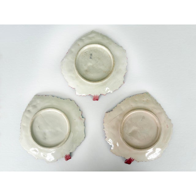 Set of three Faianças Belo geranium or cabbage leaf plates Made in Portugal, stamped Leaf-shaped plates with hand-painted...