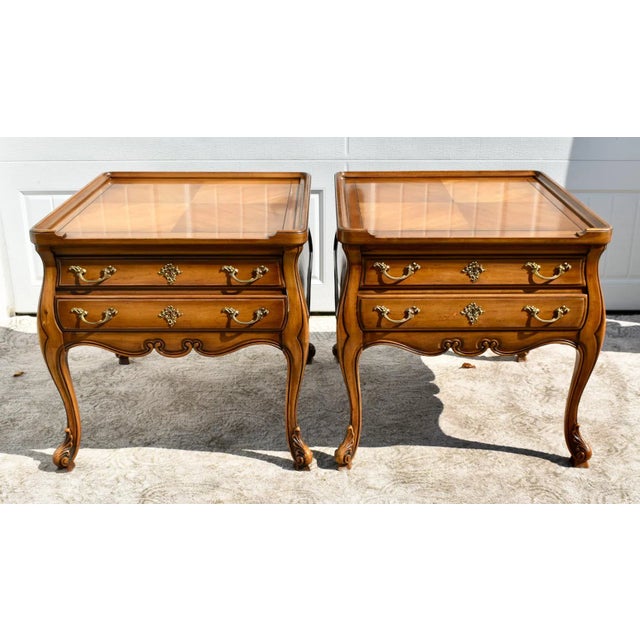 Vintage (1960's) Pair of Side/End Tables have a French Provincial Style. Made by Weiman Heirloom Tables. The Tables have a...
