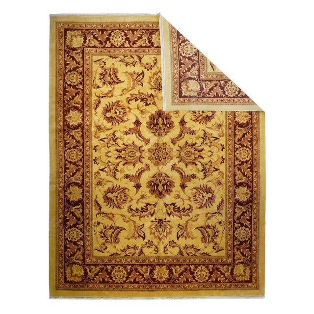 The straw field shows a large-scale centralized pattern of bold petal palmettes, equally salient double-layer barbed...