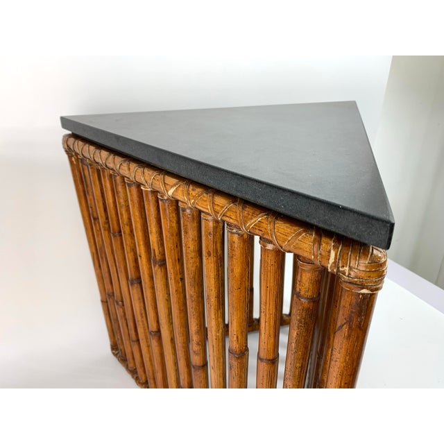Vintage McGuire bamboo and dark gray granite top side table. Measures 19.5" x 17" x 19.5" H. Marked McGuire San Francisco.