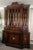A grand statement china cabinet made by Grosfeld House, designed by Lorin Jackson, late 1930s, dark mahogany original...