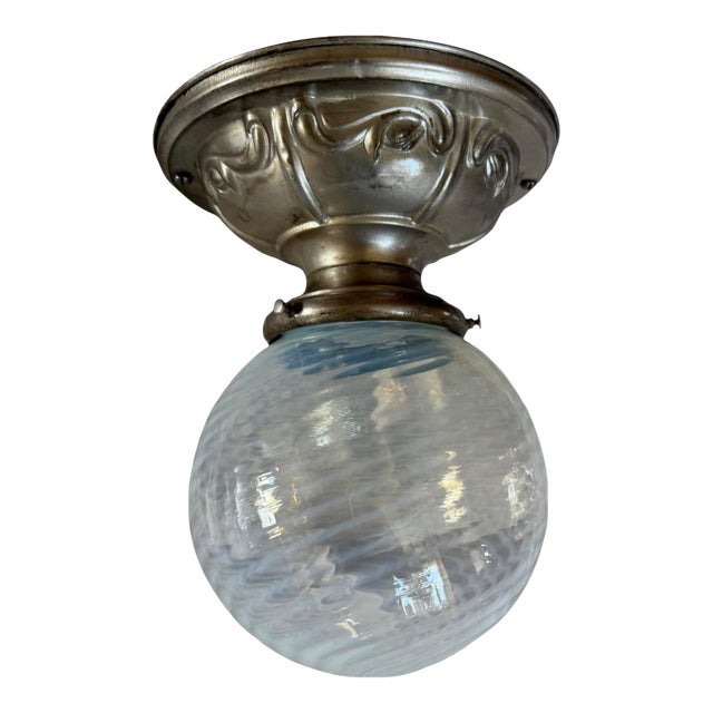 Early 20th Century Silverplate Flushmount With Phoenix Swirl Art Glass Globe Shade For Sale