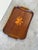 Beautiful Danish teak serving tray dating from the 1960s, featuring a refined floral marquetry inlay at the center....