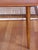 Teak wood side or coffee table in excellent condition. The top is made of teak wood, and the lower shelf is made of woven...