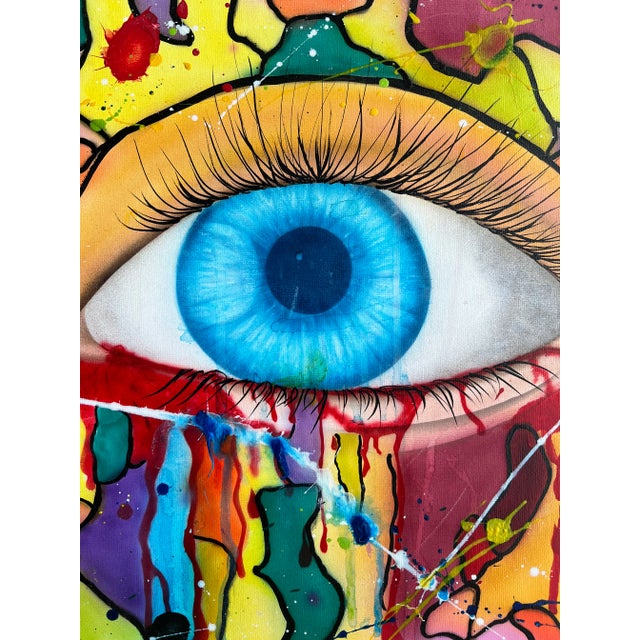 Colorful, acrylic graffiti painting with a blue ey in the center. This fabulous piece is a great addition to your...