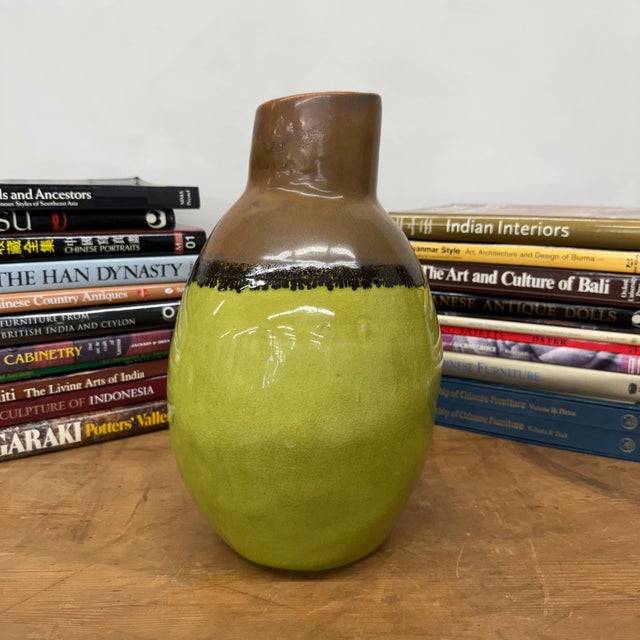 "About This Piece About This Piece This vase captures the warmth of earth and sky, blending natural tones into a rustic...