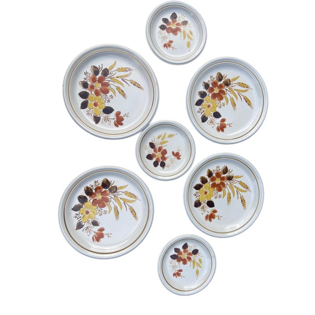 4 Serving Dinner Plates & 3 Salad Plates in Great Vintage Condition. Made of Stoneware The dinner plates in this pattern...