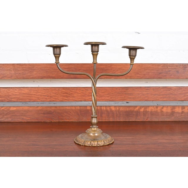 A gorgeous Art Deco or Arts & Crafts period bronze and brass triple candelabrum By Tiffany Studios New York, USA, Early...