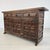 Dimensions: H 31.7” x W 58.7” x D 15” Vintage Spanish Brutalist carved sideboard with 3 drawers and 3 cupboards with...