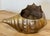 Vintage brass nautical seashell shaped planter. Made of solid brass, this piece is both durable and elegant. Natural...