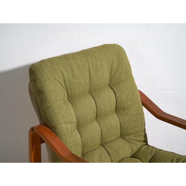 Olive green vintage armchair (c.1950)Dimensions: Length: 67 cm Depth: 72 cm Height: 87 cmStyle: Mid 20th century...