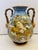 This antique vase is a prime example of Italian Renaissance style majolica pottery. hand painted with elaborate...