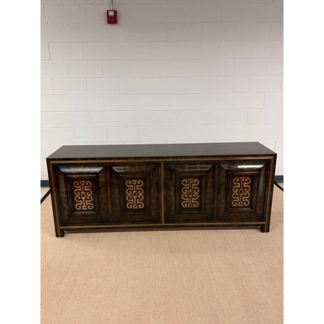 Beautiful Carpathian Burled Elm and Brass Credenza from Mastercraft circa 1970's. Condition Disclosure: Please understand...