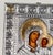 Italian silver repoussé icon of the Virgin Mary (Theotokos) holding the Christ Child, with an ornate quatrefoil-clasp...