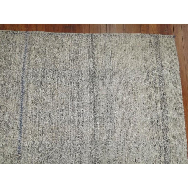 One of a kind handwoven Turkish Kilim. Measures: 6'8" x 9'11".