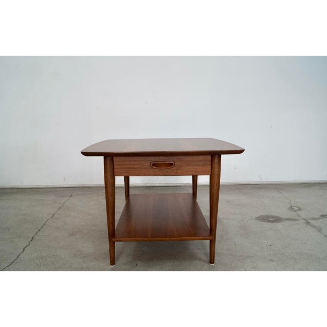Vintage 1960's Midcentury Modern side table for sale. Manufactured in 1965 by Lane, and has been professionally...