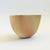 A vintage hand made pottery tea bowl by Japanese ceramicist, Kazuo Takiguchi (born 1953). Delicately formed from a single...