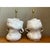 This pair of table lamps embraces an intentionally irregular, hand-built silhouette, each ceramic base rising and swelling...