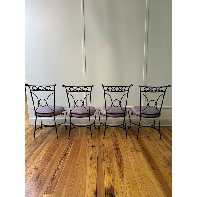 Set of 4 outdoor dining chairs by Salterini newly upholstered with Violet colored Maharam fabric. Believed to be by...