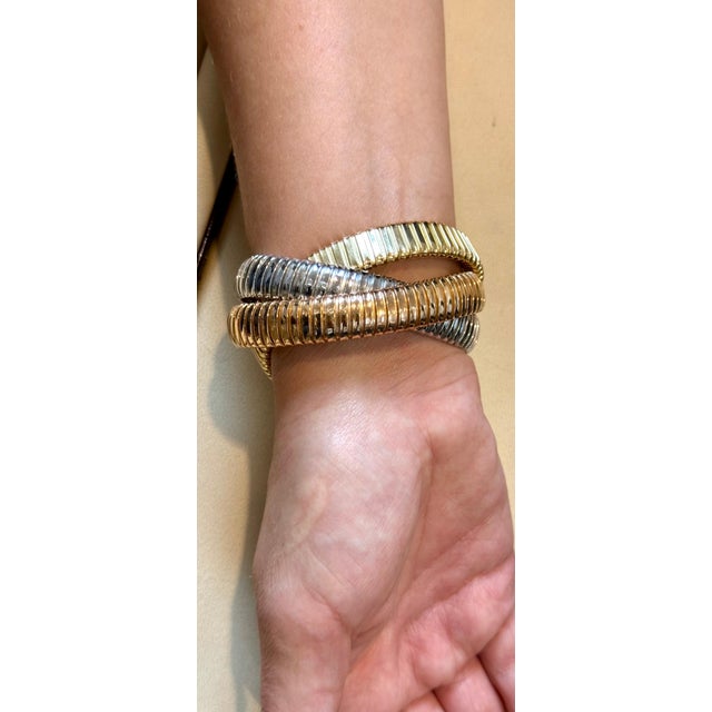 Estate"H Gold" Tri color Interwoven Rolling Stretch Bracelet 7" This iconic three-strand bracelet is handmade from a...