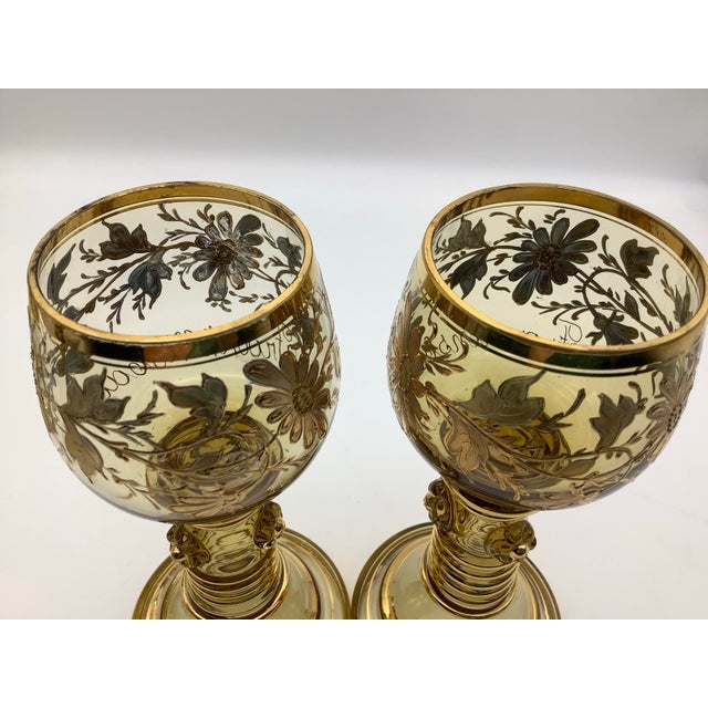 Antique Moser Bohemian hand blown wine goblet with gold floral flowers and leafs on a stem with open an end. The glasses...