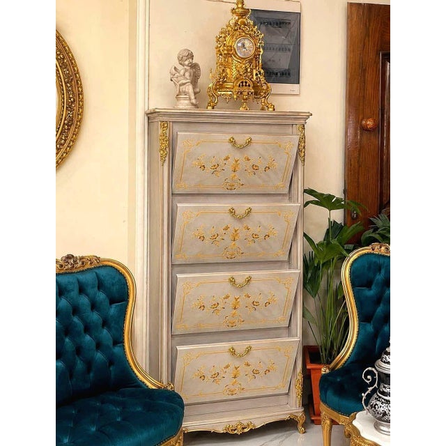 Elegant French-style shoe cabinet crafted with exquisite marquetry, intricate floral inlays, and refined bronze ormolu...