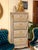 Elegant French-style shoe cabinet crafted with exquisite marquetry, intricate floral inlays, and refined bronze ormolu...