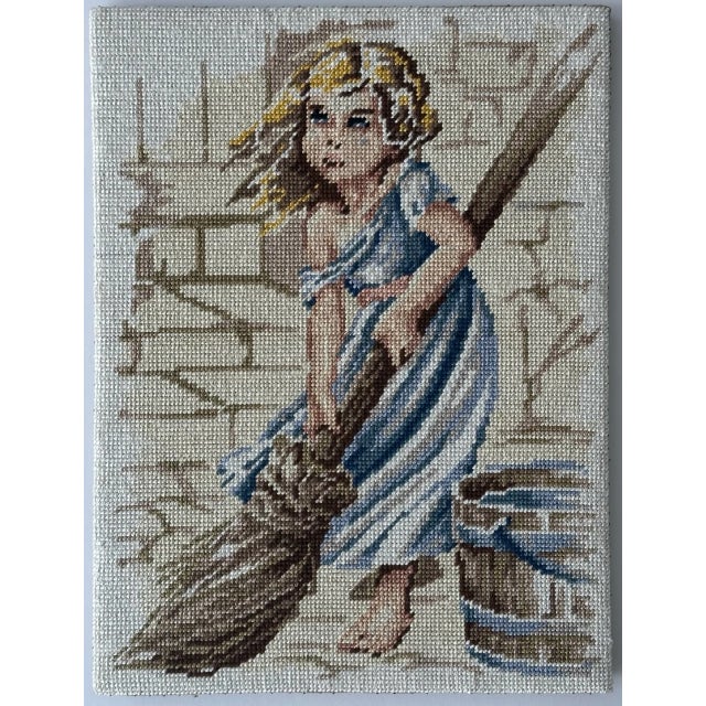 Cosette was a fictional character in Victor Hugo’s novel Les Misérables. This needlepoint was manufactured by SEG de Paris...