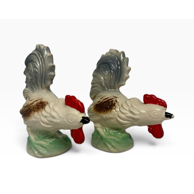 Bring a touch of playful sophistication to your mantle, library shelves, or bar cart with this vintage pair of hand-...
