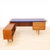 This exceptional mid-century executive desk combines elegant proportions with outstanding functionality. Crafted in richly...