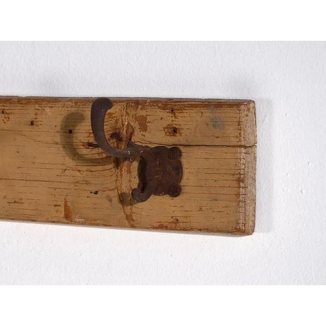 Antique solid wood coat rack (c.1920) Dimensions: Length: 100 cm Depth: 14 Height: 13 cm Style: Rustic Materials and...