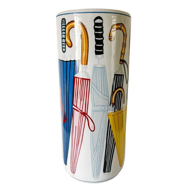 Colorful, adorable and very chic! This vintage ceramic umbrella stand with illustrated umbrellas is so vibrant and full of...