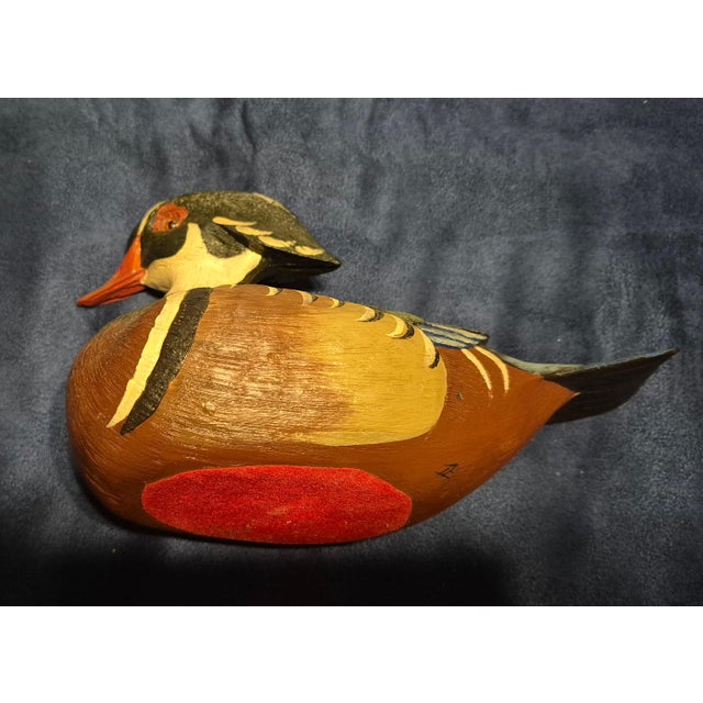 This is a vintage, hand-carved and hand-painted wood duck (Aix sponsa) drake decoy, styled in the tradition of American...