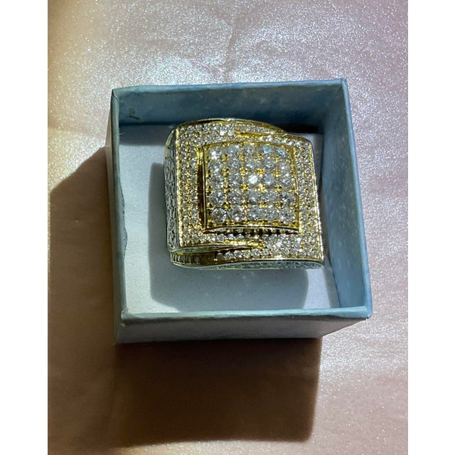 14 karat yellow gold diamond cocktail ring containing 25 round diamonds measurement 2.5 mm each, 60 round diamonds...