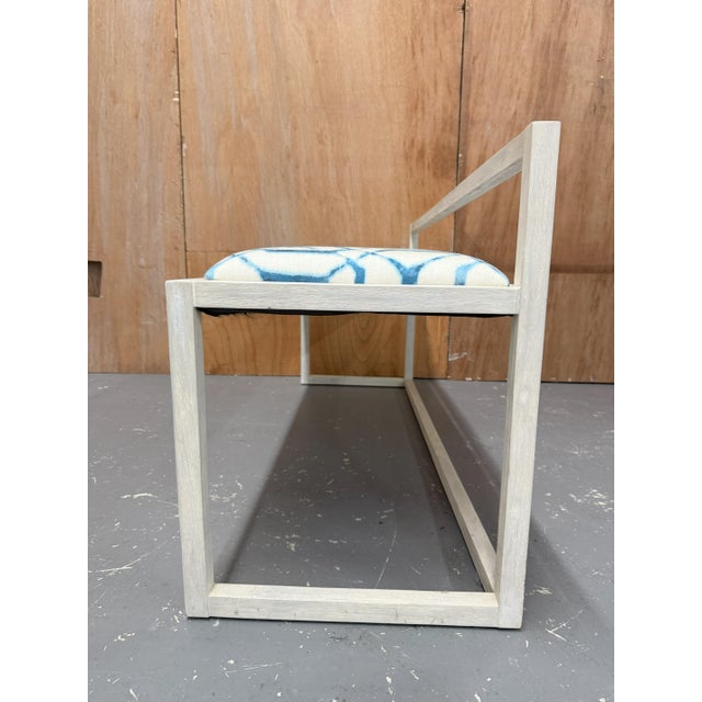 handsome wood bench with upholstered seat. in our white Oystershell finish featuring a coastal blue and white linen seat....