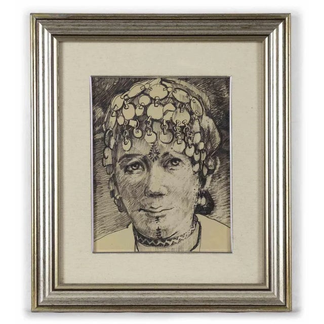 Portrait of Moroccan Woman is and original drawing realized by Helen Vogt in the Mid-20th Century. China ink drawing on...