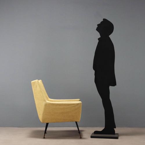 Armchair with foam padding, fabric upholstery, metal legs with brass tips. Completely renovated. This piece is attributed...