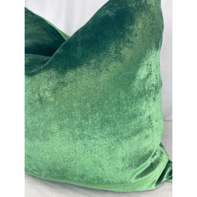 Custom pair of 22" pillows covered in an iridescent velvet in bright green. These pillows have tapered corners to prevent...
