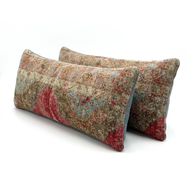 This beautiful 16'' x 47'' pillow cover set was made from authentic Turkish rug pieces. Bright colors of wool adorn the...