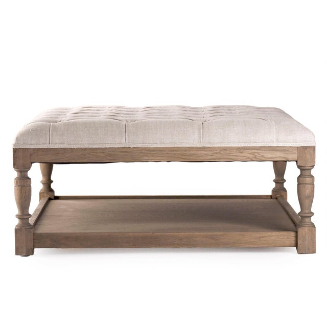 The Square Tufted Ottoman from Zentique is a versatile coffee table alternative with a button-tufted cushion top and a...