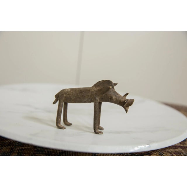:: Vintage handmade African bronze warthog. Circa mid 20th century and possibly older, this piece has such incredible...